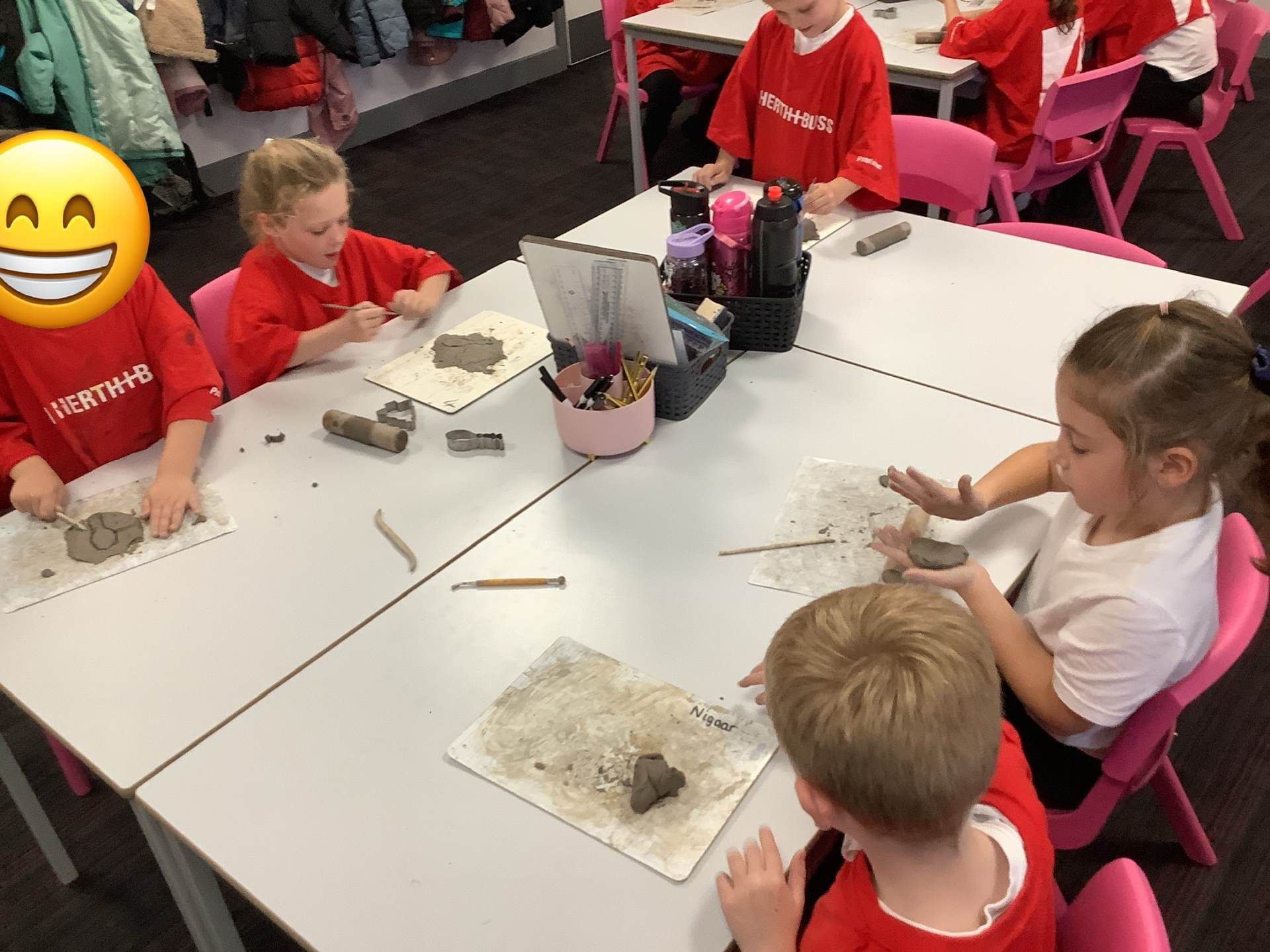 Class 5 enjoying manipulating clay.